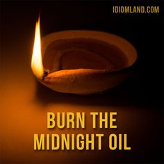 a candle burning in the middle of a dark room with text that reads burn the midnight oil