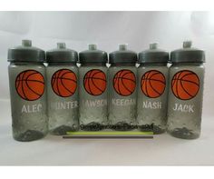 six water bottles with basketballs on them