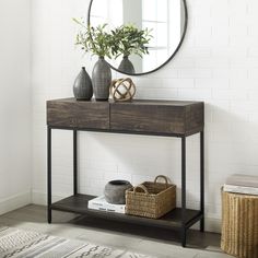 a console table with two vases on it and a mirror in the corner next to it