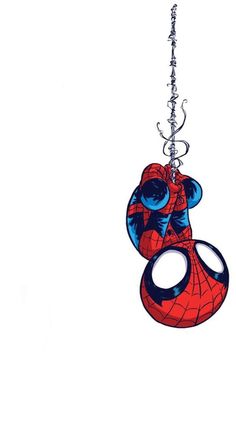 a spiderman key chain hanging from a hook