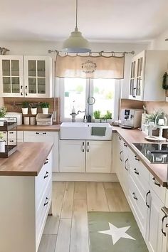 the kitchen is clean and ready for us to use in its new owner's home