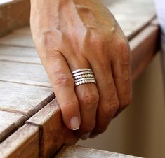 "Modern minimalist and delicate sterling silver stacking ring set. Rings are hammered and textured from 18 gauge (1mm) sterling silver wire. Each ring is unique and has nice organic texture. This listing is for a SET OF 5 individual rings! - 2 rings are made of beaded sterling silver wire and flat hammered. - 1 ring is made of sterling silver wire and hammered. - 2 rings are made of sterling silver wire and textured. You can wear as over the knuckle rings (small sizes). It's perfect for use ever Turquoise Gold Ring, Stackable Ring Sets, Stackable Rings Silver, Silver Opal Ring, Hammered Silver Ring, Silver Rings Simple, Sterling Silver Stacking Rings, Stacking Ring Set, Stack Ring