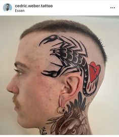 a man with a dragon tattoo on his head