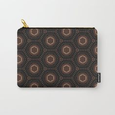 a brown and black pattern carry - all pouch