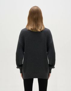 Knitwear oversize cotton sweater. One size. Fits S-L or UK 8-12.Made-to-Order.Dry clean.Model is 177 cm (69") and is wearing an S size.Size Guide XS: 32" Bust, 26" Waist, 35" Hips, 68" Length S: 33" Bust, 27" Waist, 37" Hips, 68" Length M: 35" Bust, 28" Waist, 38" Hips, 68" LengthL: 36" Bust, 30" Waist, 39" Hips, 68" Lengt Gray Drop Shoulder Sweater With Ribbed Cuffs, Oversized Gray V-neck Sweater For Fall, Oversized Knit Turtleneck Sweatshirt, Oversized Gray Knit Sweatshirt, Oversized Cozy V-neck Sweater With Ribbed Cuffs, Oversized Gray Chunky Knit Top, Oversized Chunky Knit Gray Top, Oversized Ribbed Knit Sweatshirt, Oversized Textured Knit V-neck Sweater For Winter