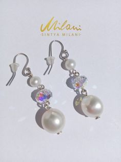 Pearl earrings Freshwater pearl Sterling silver 925 silver | Etsy Elegant Iridescent Jewelry For Pierced Ears, Elegant Iridescent Drop Jewelry, Elegant Iridescent Round Jewelry, Elegant Round Iridescent Jewelry, Silver Hypoallergenic Pearl Earrings For Party, Hypoallergenic Silver Pearl Earrings For Party, Elegant Iridescent Jewelry With High Luster, Elegant Iridescent Hypoallergenic Jewelry, Formal Sterling Silver Crystal Earrings With Pearl Drop