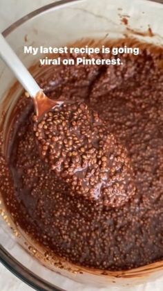 a glass bowl filled with chocolate cake batter