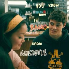 two people sitting at a table with food in front of them and the caption says you know how to ball i know ariotle