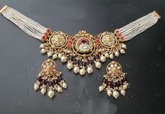 jadau Pachi kundan Bridal choker Necklace set with Earrngs/ Sabyasachi inspired choker/Real pachi kundan Necklace/ Sabyasachi wedding jewelry.Easy to wear, Light in weight & gives you a classy Look. It can be wear in festival occasion with matching salwar or saree. All the raw material used in this product is of high quality and is handcrafted with love. Partywear sabyasachi style Beautiful Bridal Jewelry Set Product Details: Type: Necklace Color: Golden color/Ruby Pink Size: Adjustable Thread O Sabyasachi Wedding, Beautiful Bridal Jewelry, Bridal Choker, Wedding Branding, 22 Carat Gold, Kundan Necklace, Semi Precious Jewelry, Choker Necklace Set, Choker Set