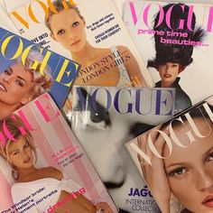 several magazine covers are stacked on top of each other in this pile, all showing different women's faces and hairstyles