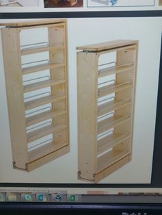 a computer screen with two wooden shelves on it