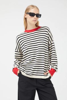 This luxuriously oversized sweater is the perfect blend of comfort and style. The fine knit creates a soft and breathable feel, while the black and white striped pattern adds a touch of timeless elegance. Maxi Jumpsuit, Swimwear Sets, Black Jersey, Long Sleeve Midi, Skirt Leggings, Fitted Sweater, Striped Sweater, Oversized Sweater, Active Wear Tops