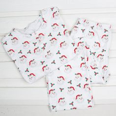 Get into the Christmas spirit with matching pajamas for you and your little ones! This women's pajama set features our classic Vintage Santa print and includes charming henley button details. The set includes a long-sleeve pajama top and coordinating pull-on pajama pants. Add a monogram for a personalized Christmas look! For a relaxed fit, please size up. XXS (0-2)XS (2-4)Small (4-6)Medium (6-8)Large (8-10)XL (12-14) White Holiday Loungewear Sets, Cotton Christmas Sleepwear For Overnight, Holiday Cotton Sleepwear For Loungewear, Holiday Cotton Loungewear Sleepwear, Holiday Family Matching Loungewear Sleepwear, Casual White Holiday Sleepwear, White Cotton Christmas Sleepwear, White Holiday Sets For Pajama Party, White Christmas Sleepwear Sets