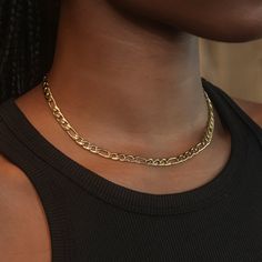 Introducing the Figaro Necklace in Yellow Gold, now in 6mm! This classic everyday chain features an iconic design of three small circular links followed by a large oval link and finished with our signature GLD clasp. Whether you're getting ready for a night out or keeping it casual, this is the perfect piece to accessorize your fit. Pair it with the 6mm Figaro Bracelet to complete the matching set! This product is guaranteed for life - GLD will repair the item should you experience any defects i Modern Jewelry With Figaro Chain And Oval Link, Modern Figaro Chain Jewelry With Oval Link, Luxury Figaro Chain Necklace With Oval Links, Classic Chunky Chain Jewelry With Oval Links, Gold Plated Figaro Chain Jewelry With Oval Link, Gold Plated Figaro Chain With Oval Link, Modern Figaro Chain Necklace With Oval Links, Classic Oval Link Chain Necklace Tarnish Resistant, Classic Oval Link Tarnish Resistant Chain Necklace