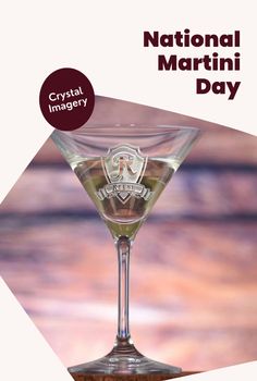 the national martini day poster is displayed in front of a wine glass with liquid inside