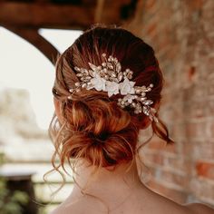 Create a picture-perfect bridal look with our exquisite Bridal Hair Comb adorned with delicate white flowers, pearl beads and sparkling clear crystals. This enchanting hair accessory is designed to add a touch of elegance and romance to your wedding hairstyle, making you look and feel like a true princess on your special day. With its timeless beauty and intricate detailing, this bridal hair comb is a must-have accessory for every bride-to-be. The beautiful flowers are made from porcelain which add delicate bohemian vibes. Flower Bridal Hair, Floral Headpiece Wedding, Pearl Accessories, Bridal Hair Flowers, Wedding Hairstyle, Bridal Headpiece, Porcelain Flowers, Bridal Look, Bridal Crown