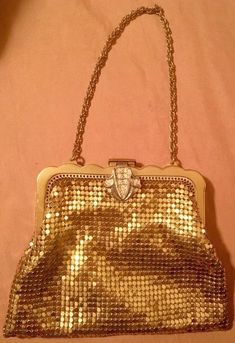 "Vintage 1930s Classic Gold Metal Mesh WHITING & DAVIS Evening Out Bag Purse, Small Gold Coin Clutch Purse w/Metal Snap Closure, Gold Metal Chain Handle Beautiful interior with brass frame, it has just one single chain for handle. Measures: 9\" high from top of handle to bottom of bag. 5.5\" wide at bottom of bag, 5\" at middle and 4\" at top and it opens 4\" wide. The inside is lined in a gold sateen material. It has a few snags and marks as seen in pictures, but takes little away from the Gold Purse, Vintage Evening Bags, Quilted Wallet, Gold Bag, Evening Purse, Vintage Purses, Vintage Bag, Vintage Purse, Mesh Bag