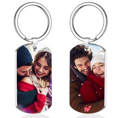 two key chains with an image of a man and woman in the same photo on them