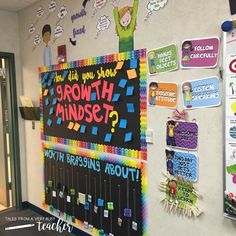 a bulletin board with writing on it in front of a wall covered in magnets