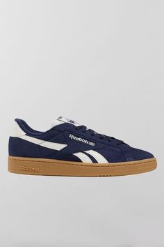 Reebok Club C Grounds UK sneakers. Reebok's iconic Club Cs with an '80s vintage feel, the Club C Grounds UK sneakers have a soft suede upper with smooth side stripes and heel tab. Features. Reebok Club C Grounds UK sneakers '80s aesthetic sneakers in soft suede Lace-up style Content + Care. Suede, rubber Spot clean Imported Urban Outfitters Aesthetic, Reebok Shoes Women, Aesthetic Sneakers, Blue Reebok, 80s Aesthetic, Funky Shoes, Reebok Club C, Vintage Sneakers, Club C