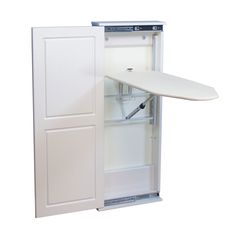 an open refrigerator with a surfboard on the door