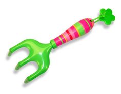 a green and pink plastic toy with a flower on it's tip is shown