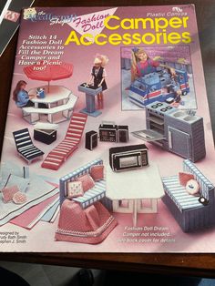 an advertisement for a camper accessories catalog sitting on a table with chairs and couches