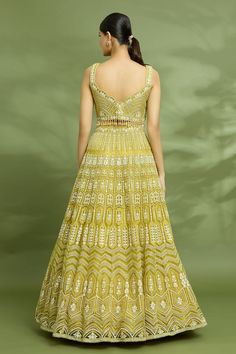 Golden mustard cancan attached lehenga featuring geometric motif in sequin, gota and applique work. Paired with a padded hand embroidered tassel detailed blouse and a hand embroidered dupatta. - Aza Fashions Hand Embroidered Dupatta, Lehenga Pattern, Applique Work, Geometric Motif, Embroidered Lehenga, Lehenga Blouse, Yellow Silk, Embroidered Dupatta, Set For Women