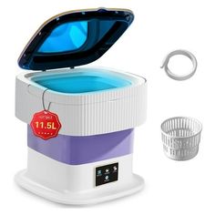 an image of a portable washing machine with the lid open and its contents in front