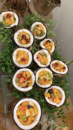 an arrangement of fruit is displayed on a table