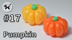 two plastic pumpkins sitting next to each other