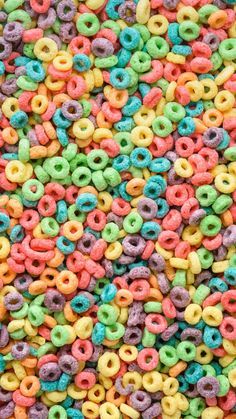 there are many different colored cereals in this photo