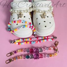 2pcs Colorful shoe Chains -Color: as shown -Include: 2pcs shoe Chains -Use: could be used for croc shoe decoration -Style: as shown these are very nice shoe charms all products will shipped from Hong kong. For most countries, it will take 20 days to arrive. Have a nice day! Cheap White Fun Shoe Charms, Shoe Charm Ideas, Trendy Multicolor Shoe Charms For Gifts, Shoe Accessories Diy, Shoe Chains, Colorful Shoe, Croc Shoe Charms, Business Accessories, Shoe Decoration