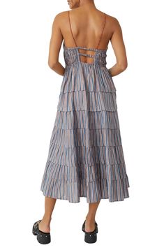 Free People Going Steady Ruffle Sundress | Nordstrom Cotton Sundress With Tie And Ruffled Straps, Beach Tiered Cotton Dress With Ruffle Hem, Tiered Cotton Sundress With Adjustable Straps, Cotton Tiered Dress With Ruffle Hem For Beach, Cotton Tiered Beach Dress, Cotton Tiered Dress For The Beach, Cotton Tiered Skirt Sundress For Beach, Cotton Sundress With Tie Back And Ruffled Straps, Striped Tiered Dress With Ruffle Hem