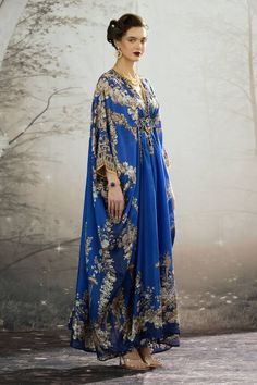 Blue silk long kaftan with all over regal floral prints and patch work waist belt. - Aza Fashions Blue Bollywood Style Abaya For Eid, Royal Blue Long Kaftan, Royal Blue Kaftan For Eid, Bohemian Blue Abaya For Wedding, Blue Bohemian Abaya For Wedding, Blue Bohemian Wedding Abaya, Bohemian Blue Abaya For Festive Occasions, Elegant Blue Floral Print Kaftan, Bohemian Blue Festive Abaya