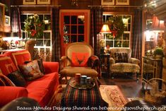 a living room filled with furniture and christmas decorations