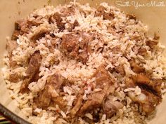 rice and meat are mixed together in a bowl