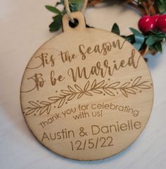 a wooden ornament that says, it's the season to be married