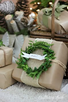 presents wrapped in burlap and tied with twine are sitting on the floor