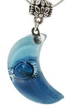 Baby blue and Blue moon shape glass pendant The Glass bead is approx 1.25'' long and .75'' wide. The chain is approx 18 inches long. Silver Plated "snake" chain with a lobster claw clasp. (if you need a longer chain please send a note with your purchase) All the jewelry is handmade out of recycled glass. This is real glass that comes from windows and other more traditional sources. The glass is cut and assembled, then fired in a kiln to fuse round sharp edges and improve the colors and texture o Blue Resin Round Pendant Necklace, Handmade Blue Moon-shaped Necklaces, Handmade Blue Moon Shaped Necklace, Handmade Blue Moon Necklaces, Blue Moon Phase Round Pendant Necklace, Blue Moon Charm Pendant Necklace, Blue Crescent Necklace For Gifts, Blue Crescent Necklace For Gift, Blue Moon Phase Round Pendant Jewelry