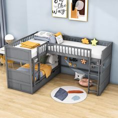 a child's bedroom with two bunk beds and a rug on the floor in front of it