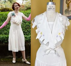 vintage very early 1930s dress, made of a lightweight bright white silk.  technically just a sporty day dress, but would make a great candidate for a casual courthouse weddings.  ➡ the cap sleeves + giant collar are finished with square-notched edges, fluttering with every step. ➡ small modest panel snaps in across the bust (this is just tacked + snapped in, in case you want to remove it) ➡ hand embroidered flowers finish the collar, in baby pink, yellow, lavender + blue ➡ attached belt ties in Embroidery Square, Vintage 1930s Dress, 1930s Dress, Hand Embroidered Flowers, Courthouse Wedding, Lavender Blue, White Silk, Dress Floral, Collar And Cuff