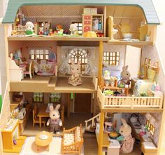 a doll house with all the furniture and accessories