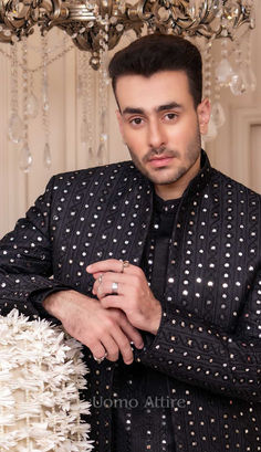 luxury black prince coat Elegant Nehru Jacket With Mirror Work For Festivals, Formal Kurta With Mirror Work For Diwali, Formal Mirror Work Kurta For Diwali, Traditional Black Sherwani For Party, Black Sherwani For Party And Festivals, Black Sherwani With Dabka Work For Party, Black Sherwani With Resham Embroidery For Party, Black Sherwani For Diwali Party, Black Party Wear Kurta For Diwali