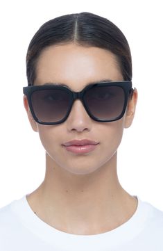 A smooth D-frame silhouette fitted with logo temples brings ultramodern vibes to these sunglasses that provide full-coverage UV protection. 54mm lens width; 22mm bridge width; 148mm temple length 100% UV protection Recycled acrylic Imported Summer Wardrobe Essentials, Sneaker Slippers, Wedding Guest Shoes, Sports Blazer, Baby Boy Shoes, Boy Shoes, Hair Fragrance, Made Clothing, Denim Leggings