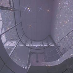 the inside of a building with stars on the ceiling