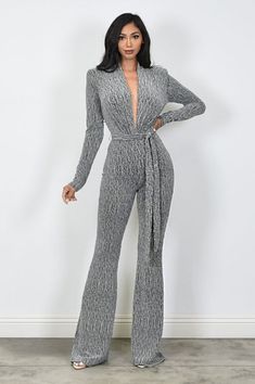 deep v-neck long sleeve flare leg jumpsuit Brand: Cameo Style: C3266 Fabric: Details: Model (in cover photo) is wearing a small. - MODEL STATS- Height: 5'8" Bust:34" / Waist:26" / Hip:38" Made in USA Flare Leg Jumpsuit, Cover Photo, Fabric Details, Deep V Neck, Cover Photos, Deep V, Made In Usa, Jumpsuit, V Neck