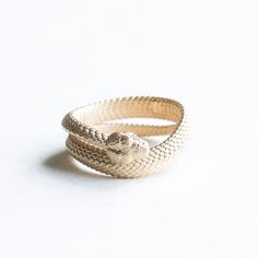 A wrap around sculpture snake with intricate detailing inside and out.  Metal: 14k yellow gold Approx 8mm band width (varies by size)  Available in rose, yellow or white gold.  FREE SHIPPING USA- All of our jewelry will arrive in custom packaging ready for gift giving.  SATISFACTION GUARANTEED All pieces are carefully examined prior to delivery.  If item is damaged upon delivery, we will offer full refund. Please first message us regarding your return within 24hrs. Please do send the item back i Snake-shaped Yellow Gold Wedding Ring, Yellow Gold Snake Ring For Wedding, 14k Gold Snake-shaped Ring, Gold Fine Jewelry Snake-shaped Ring, Luxury 14k Gold Snake Ring, Unique Snake-shape Wedding Ring, Unique Yellow Gold Snake-shaped Ring, 14k Gold Snake Ring, Spiral Snake