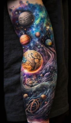 an arm tattoo with planets and stars on the outer half of it, as well as other