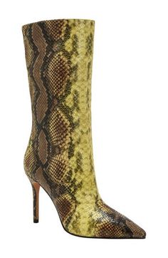 A pointy toe and stiletto heel balance a fierce boot fashioned with a snake-embossed upper for statement-making appeal. 3 1/2" heel 9 1/4" shaft; 13 3/4" calf circumference Pull-on style with elastic gore inset Synthetic upper and lining/synthetic and rubber sole Imported Ankle Length Boots, Shaft Boots, Pointed Toe Boots, Katy Perry, Stiletto Heel, Boot Shoes Women, Fashion Boots, Ankle Length, Stiletto Heels